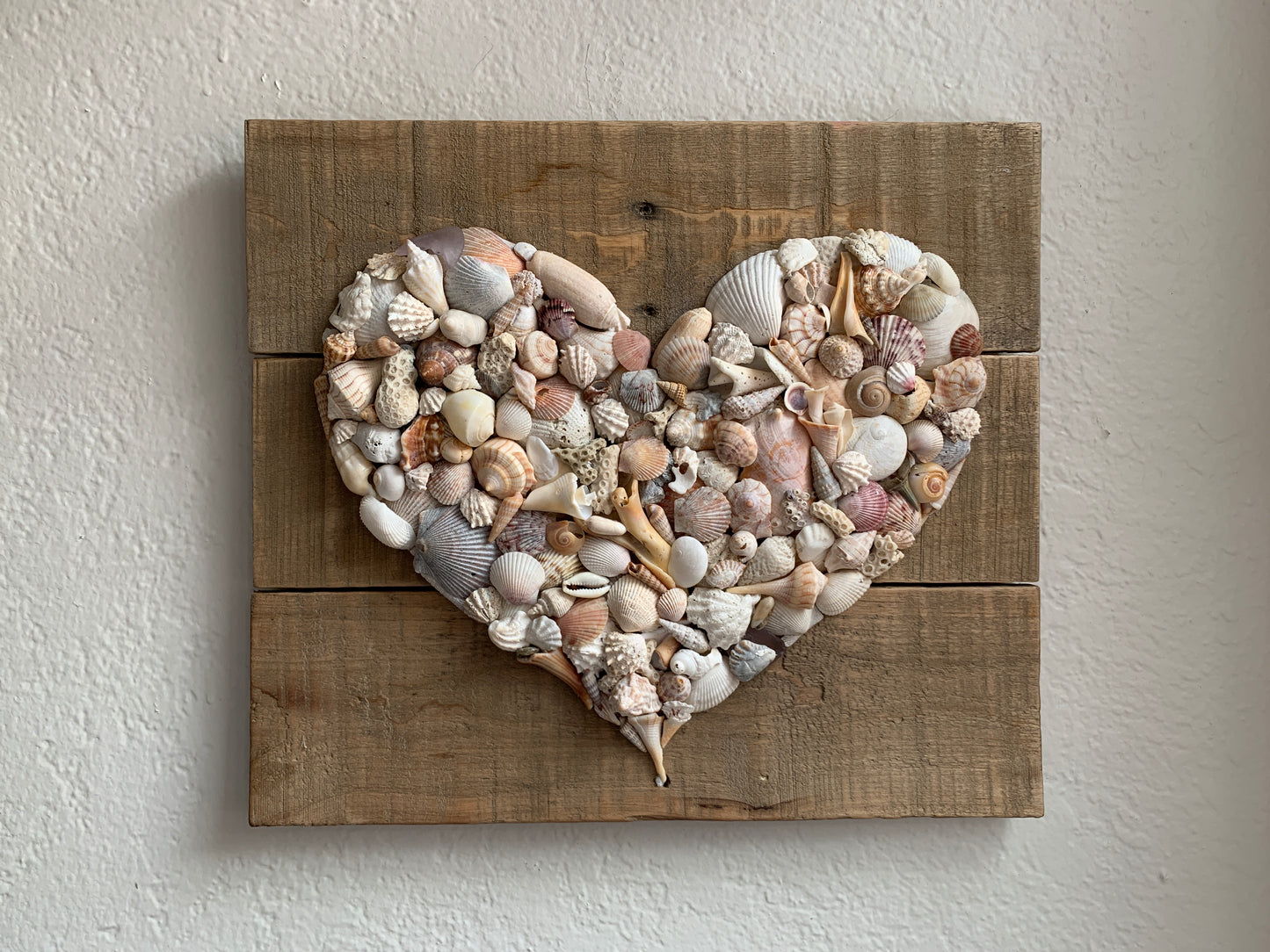 Seashell heart on pallet